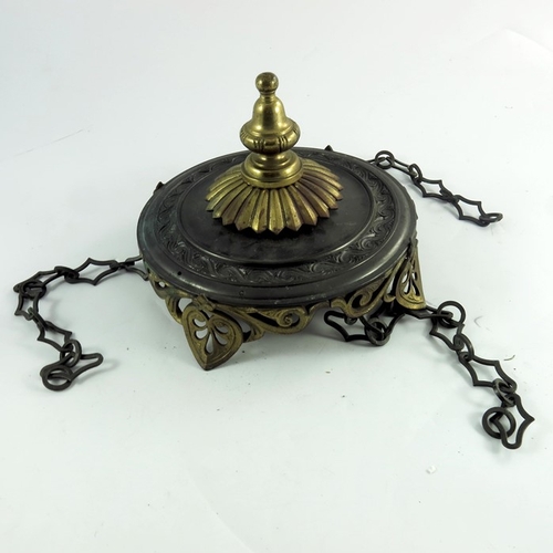 594 - A Victorian gilt metal pendant lantern, circa 1860, reticulated honeysuckle foliate gallery suspende... 