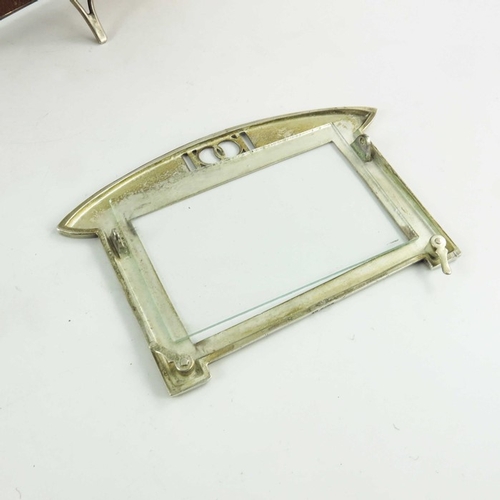 604 - WMF, a pair of Jugendstil silver plated photo frames, rectangular landscape form, the lozenge top pi... 