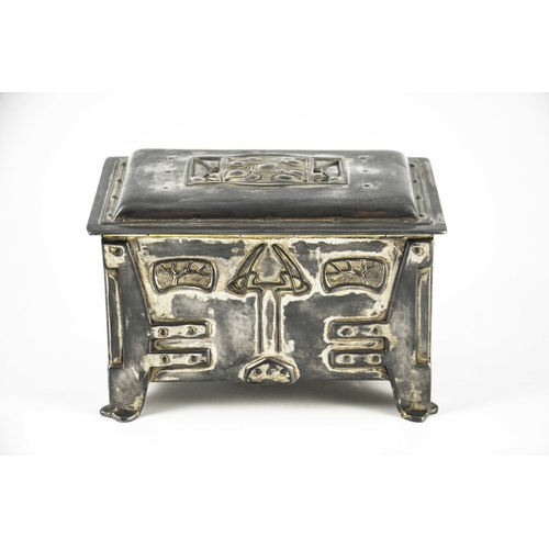 606 - A Secessionist pewter casket, cuboid form, embossed in relief with angular rivet work straps and cor... 