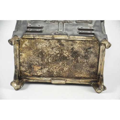 606 - A Secessionist pewter casket, cuboid form, embossed in relief with angular rivet work straps and cor... 