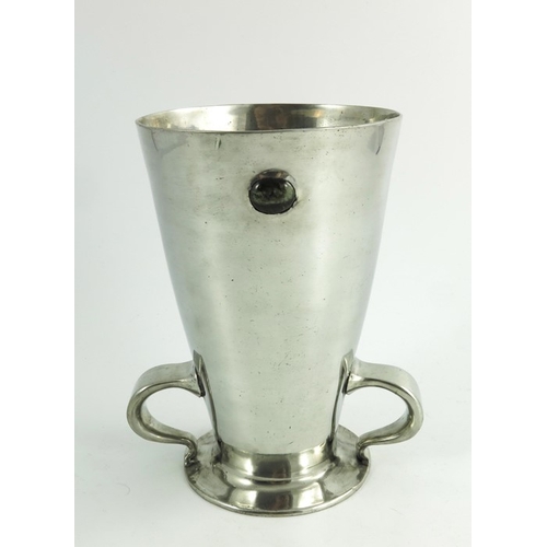 611 - Oliver Baker for Liberty and Co., a Tudric pewter and Conamara marble vase, model 045, footed conica... 