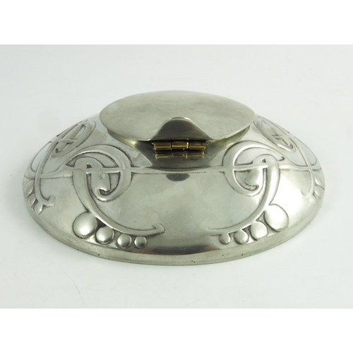 612 - Archibald Knox for Liberty and Co., a Tudric pewter inkwell, model 0521, shallow circular domed form... 