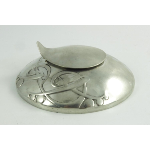 612 - Archibald Knox for Liberty and Co., a Tudric pewter inkwell, model 0521, shallow circular domed form... 