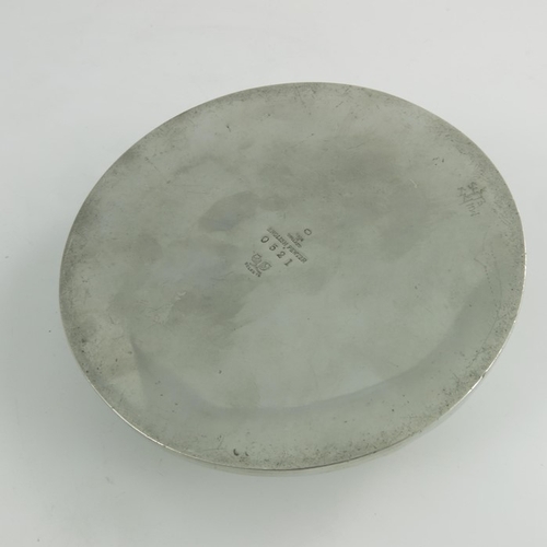 612 - Archibald Knox for Liberty and Co., a Tudric pewter inkwell, model 0521, shallow circular domed form... 