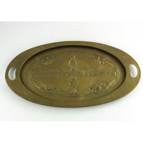 621 - Margaret Gilmour (attributed), a Glasgow School Arts and Crafts brass tray, oval form, repousse deco... 