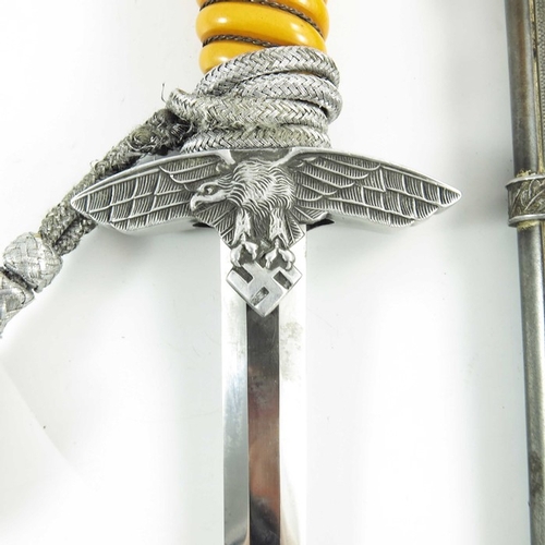 633 - Third Reich German Airforce (Luftwaffe) 2nd Pattern Officer's dress dagger, housed in hammered scabb... 