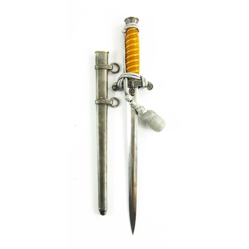 635 - World War Two German Army (Wehrmacht) Officer's dress dagger, housed in hammered scabbard with silve... 