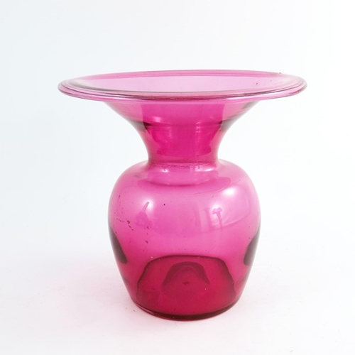 671 - A Victorian cranberry glass spittoon, with wide flared and folded rim