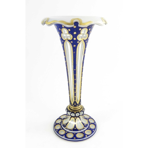 672 - A Bohemian glass vase, white and blue overlaid with gilding,trumpet Lily form, circa 1890, 30cm high... 