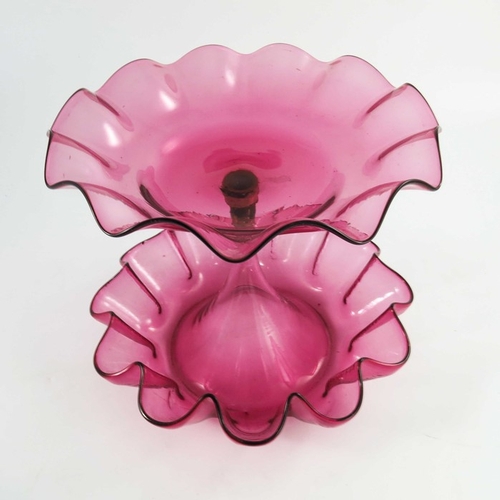 673 - A Victorian cranberry glass two tier epergne, circa 1880, crimped, 21.5cm high