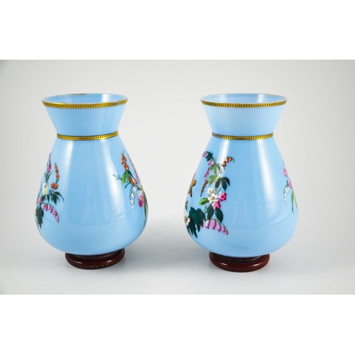 675 - A pair of enamelled glass vases, conical baluster form, blue opaque with gilt banding, in the Japone... 