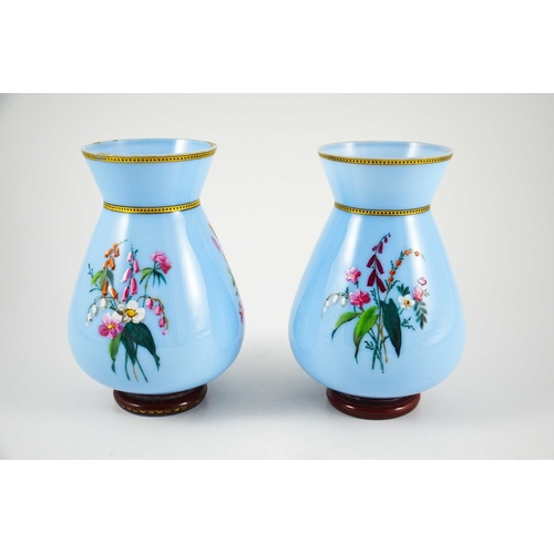 675 - A pair of enamelled glass vases, conical baluster form, blue opaque with gilt banding, in the Japone... 