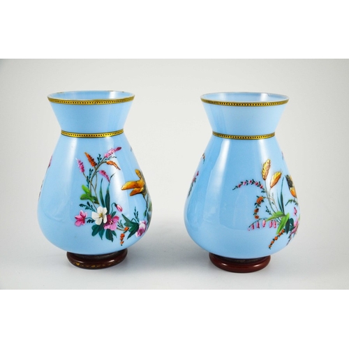 675 - A pair of enamelled glass vases, conical baluster form, blue opaque with gilt banding, in the Japone... 