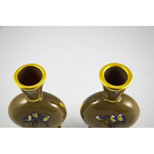 676 - A pair of Bohemian enamelled glass vases, footed flat moonflask form with conical necks, brown opaqu... 