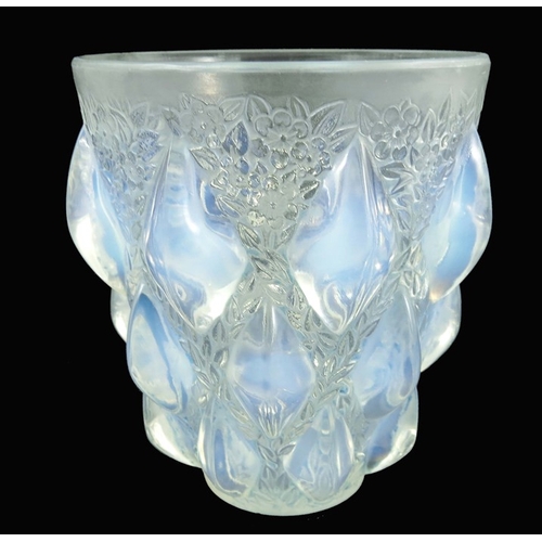 740 - Rene Lalique, a Rampillons glass vase, model 991, designed circa 1927, blue opalescent, incised mark... 