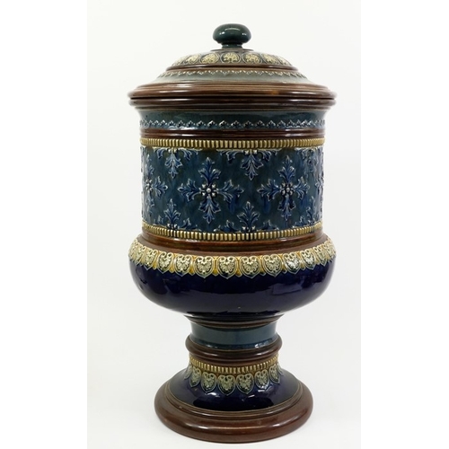 767 - A Royal Doulton art ware blue and brown decorated water filter, 48cm high