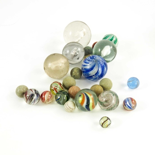 784 - A box containing four Sulphide and other Victorian glass and stone marbles, 12mm to 44 mm