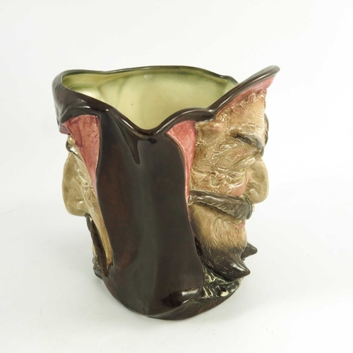 822 - A Royal Doulton large character jug, double sided Mephistopheles,  printed marks, 15cm high