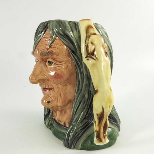 823 - A Royal Doulton large character jug, Pendle Witch, clothing painted in a colourway, Royal Doulton ba... 