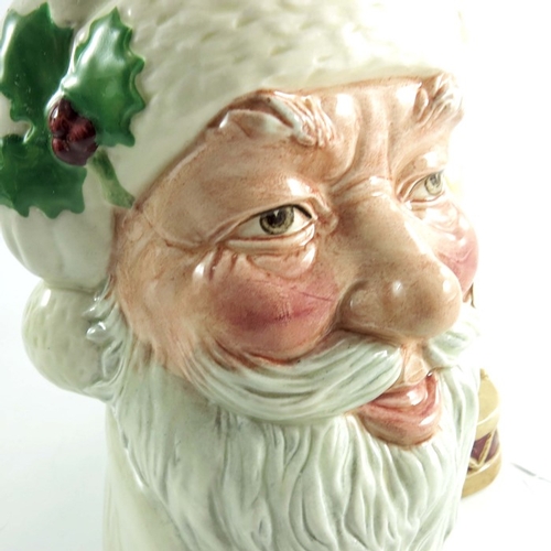 832 - A Royal Doulton large character jug, Santa Claus doll handle, unfinished white hat, Royal Doulton ma... 