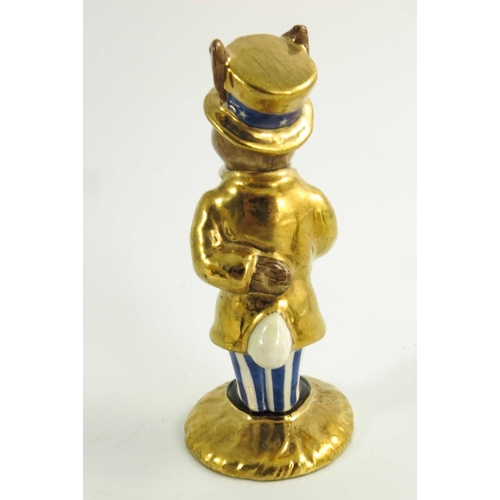 906 - A group of Three Royal Doulton Bunnykins, Uncle Sam, Santa and another all prototype with gold highl... 