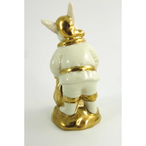 906 - A group of Three Royal Doulton Bunnykins, Uncle Sam, Santa and another all prototype with gold highl... 