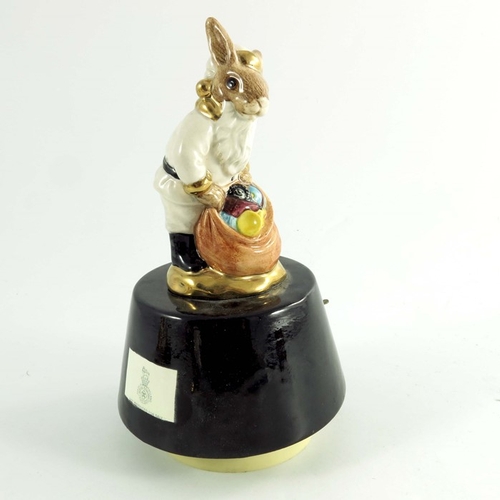 910 - A group of Three Royal Doulton Bunnykins, Santa music box, Doctor and Jack Horner all prototype some... 