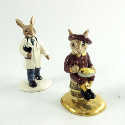 910 - A group of Three Royal Doulton Bunnykins, Santa music box, Doctor and Jack Horner all prototype some... 