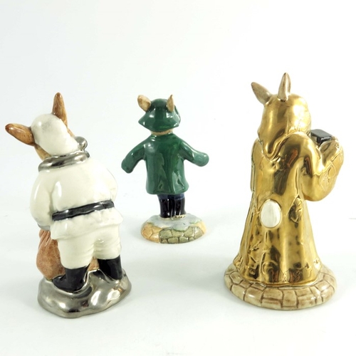 913 - A group of Three Royal Doulton Bunnykins, Santa, Sands Of Time and Rainy Day  all prototype some wit... 