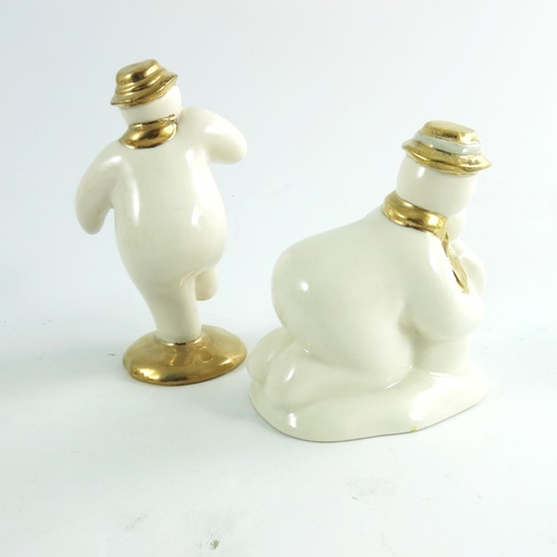 932 - Two Royal Doulton snowmen figures, Build a snowman and The Snowman, gold and silver highlights colou... 