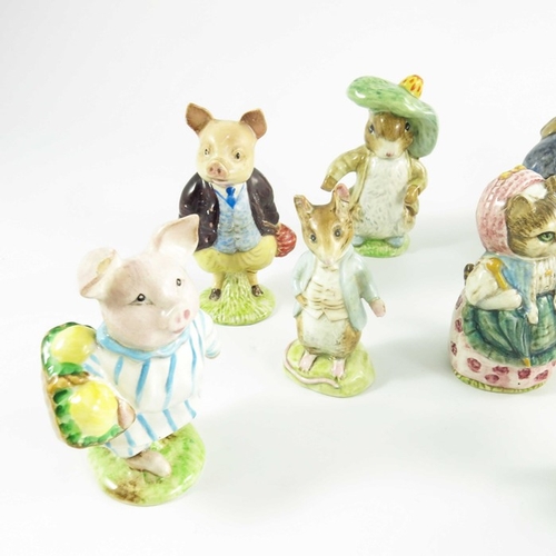 936 - A group of fourteen Beswick Beatrix Potter figures, gold backstamps, printed marks (14)