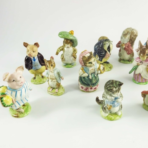 936 - A group of fourteen Beswick Beatrix Potter figures, gold backstamps, printed marks (14)