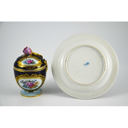 973 - A Meissen lidded pot and plate, footed ovoid form, cobalt blue ground with tooled gilt wreaths and f... 