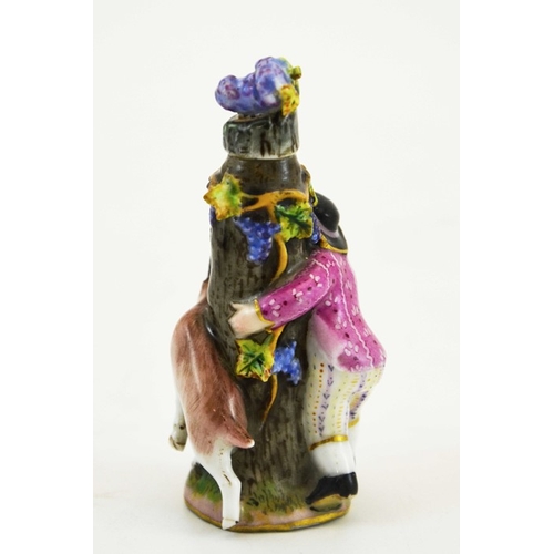 975 - A Meissen porcelain scent bottle, circa 1900, modelled as a boy and goat around a tree stump, the li... 