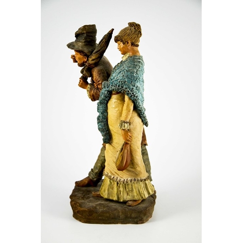 1003 - A Continental figure group of a man and woman with parasol and mandolin, 19th century, probably Germ... 