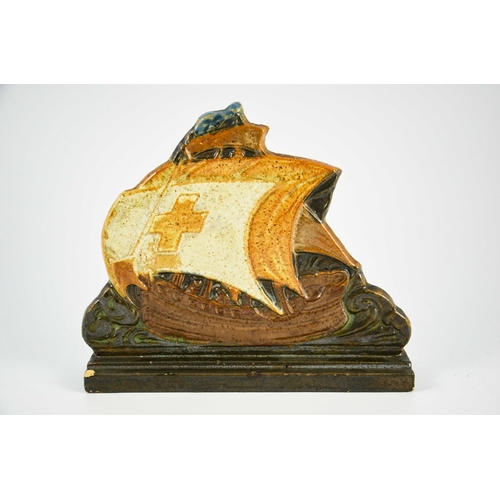 1008 - A Continental art pottery relief moulded sculpture, modelled as a galleon, on integrated plinth, pro... 