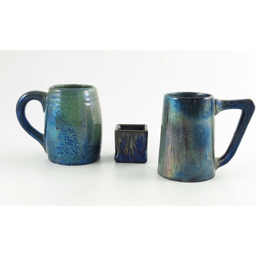 1013 - Alphonse Cytere for Rambervillers, two Art Nouveau lustre mugs, conical and ribbed barrel forms, and... 