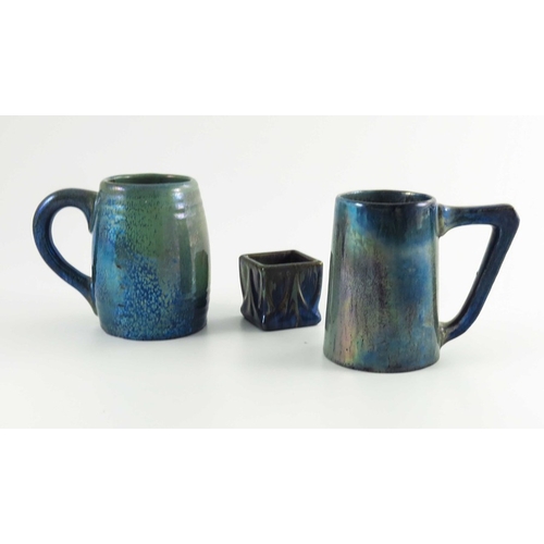 1013 - Alphonse Cytere for Rambervillers, two Art Nouveau lustre mugs, conical and ribbed barrel forms, and... 