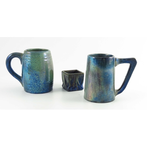 1013 - Alphonse Cytere for Rambervillers, two Art Nouveau lustre mugs, conical and ribbed barrel forms, and... 