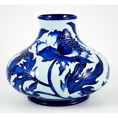 1041 - Philip Gibson for Moorcroft, a blue on blue Peony vase, 1999, squat bulboud form, impressed marks, 1... 