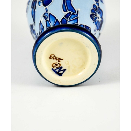 1055 - Carole Lovett for Moorcroft, a small Florian Echo vase, 2003, blue on blue, impressed marks, 10cm hi... 