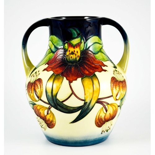 1067 - Nicola Slaney for Moorcroft, an Anna Lily vase, circa 1998, twin handled amphora form, impressed mar... 