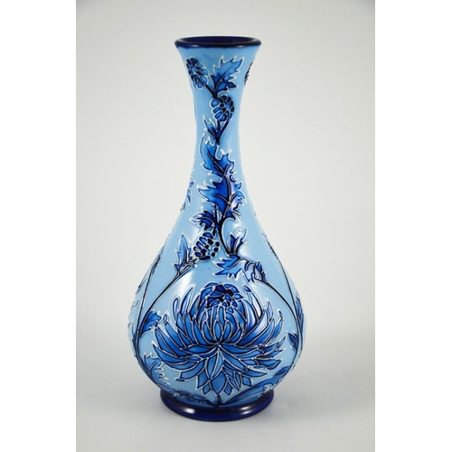 1070 - Philip Gibson for Moorcroft, a Chrysanthemum Blue on Blue vase, 2003, bottle form, impressed marks, ... 