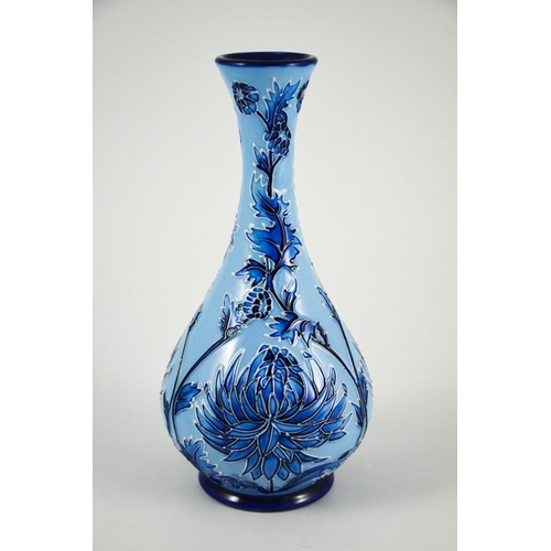 1070 - Philip Gibson for Moorcroft, a Chrysanthemum Blue on Blue vase, 2003, bottle form, impressed marks, ... 