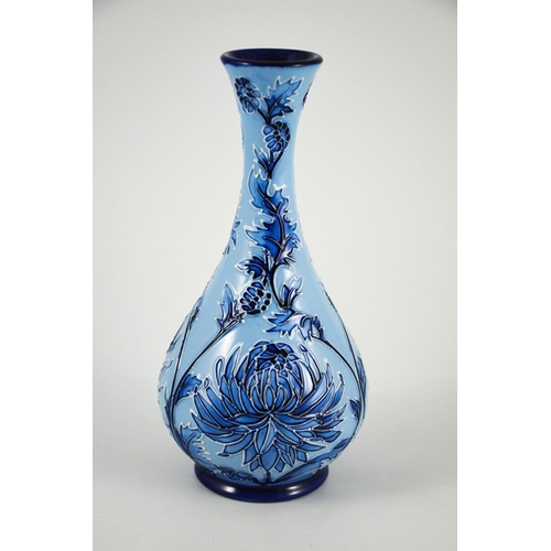 1070 - Philip Gibson for Moorcroft, a Chrysanthemum Blue on Blue vase, 2003, bottle form, impressed marks, ... 