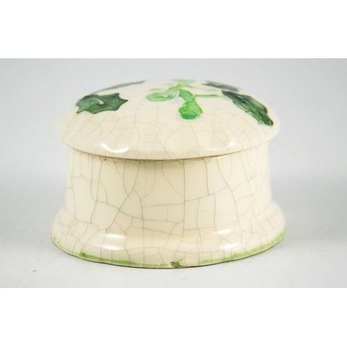 1077 - Lisa B Moorcroft, a Holly pot and cover, 1989, cylindrical form with domed lid, tubelined, incised i... 