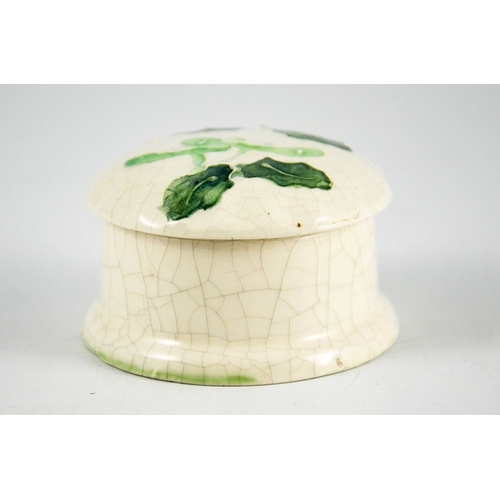 1077 - Lisa B Moorcroft, a Holly pot and cover, 1989, cylindrical form with domed lid, tubelined, incised i... 