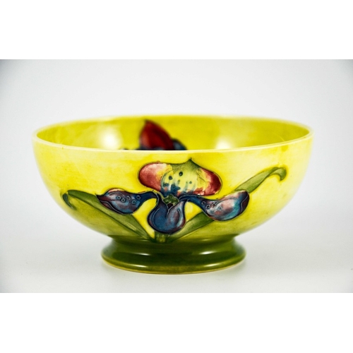 1086 - Walter Moorcroft, an Orchid bowl, circa 1950s, footed form, yellow draining to green, impressed mark... 