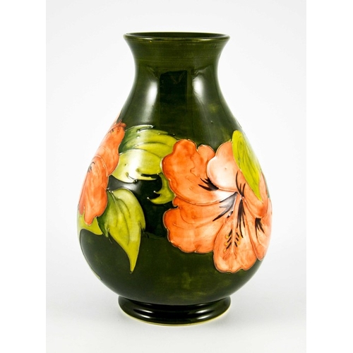 1090 - Walter Moorcroft, a Hibiscus vase, circa 1960s, baluster form, pink on green, impressed marks, under... 