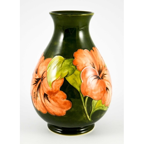 1090 - Walter Moorcroft, a Hibiscus vase, circa 1960s, baluster form, pink on green, impressed marks, under... 